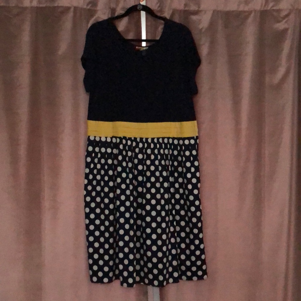 ModCloth navy dress with white polka dots and yellow waist